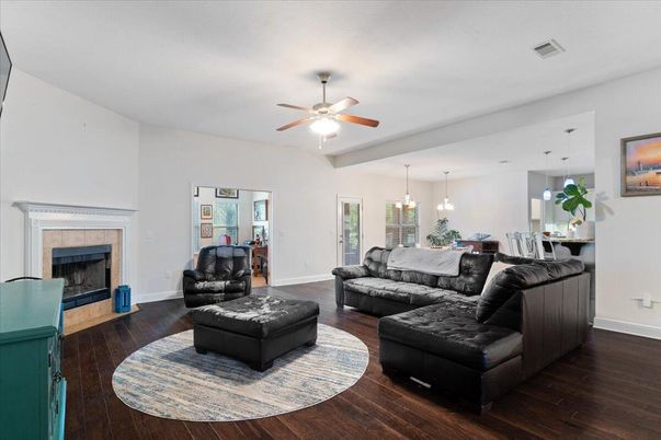Dining room, Fireplace, Interior, Living room, Pendant Lights, Wood Texture Flooring
