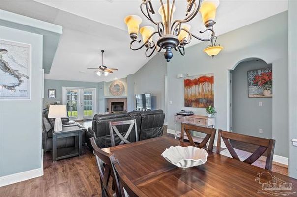 Chandelier, Dining room, Fireplace, Interior, Living room, Pendant Lights, Wood Texture Flooring