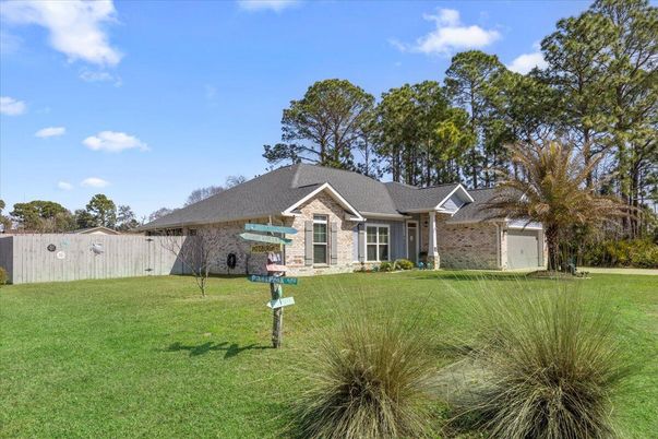 Attached, Backyard, Exterior, Facade, Brick Facade, Ranch