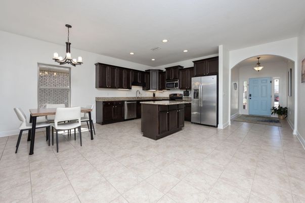 Chandelier, Dining room, Interior, Kitchen, Pendant Lights, Recessed Lighting, Stainless Steel Appliances