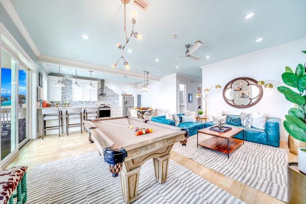 Billiard Table, Game Room, Interior, Kitchen, Living room, Pendant Lights, Recessed Lighting, Stainless Steel Appliances, Wood Texture Flooring