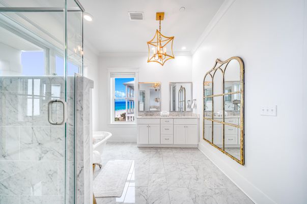 Bathroom, Dual Sink Vanities, Glass Shower, Interior, Marble, Marble Walls, Pendant Lights, Recessed Lighting