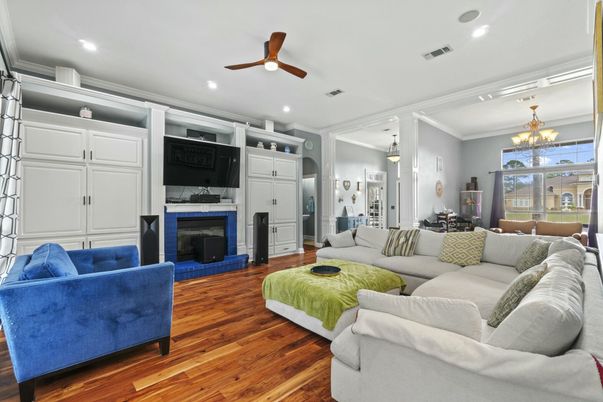 Chandelier, Dining room, Fireplace, Interior, Living room, Pendant Lights, Recessed Lighting, Wood Texture Flooring