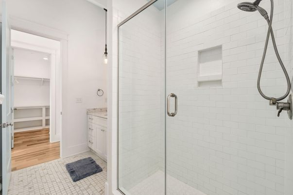 Bathroom, Glass Shower, Interior, Pendant Lights, Recessed Lighting, Wood Texture Flooring