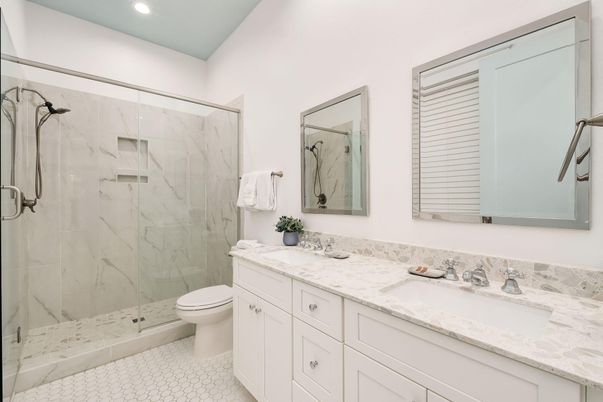 Bathroom, Dual Sink Vanities, Glass Shower, Interior, Marble Walls, Recessed Lighting