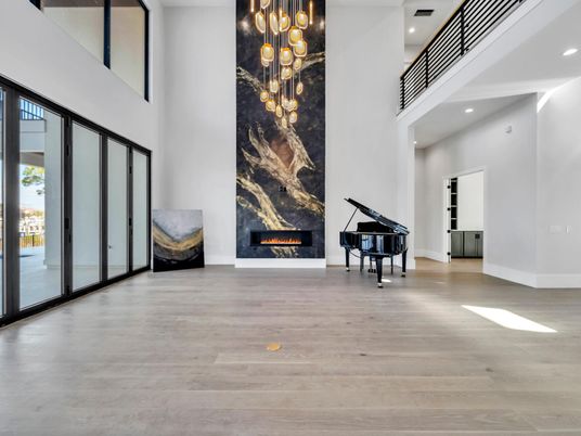 Fireplace, Interior, Pendant Lights, Piano, Recessed Lighting, Wood Texture Flooring