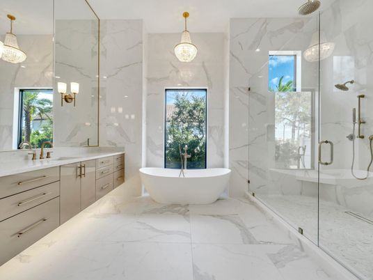 Bathroom, Dual Sink Vanities, Free Standing Baths, Glass Shower, Interior, Marble, Marble Walls, Pendant Lights