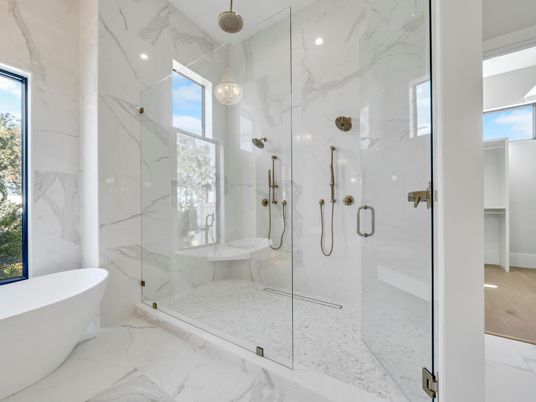 Bathroom, Free Standing Baths, Glass Shower, Interior, Marble, Marble Walls, Pendant Lights, Recessed Lighting