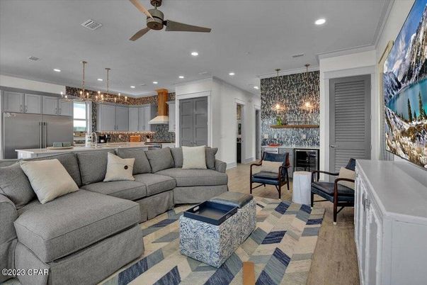 Fireplace, Interior, Kitchen, Living room, Pendant Lights, Recessed Lighting, Stainless Steel Appliances, Wood Texture Flooring