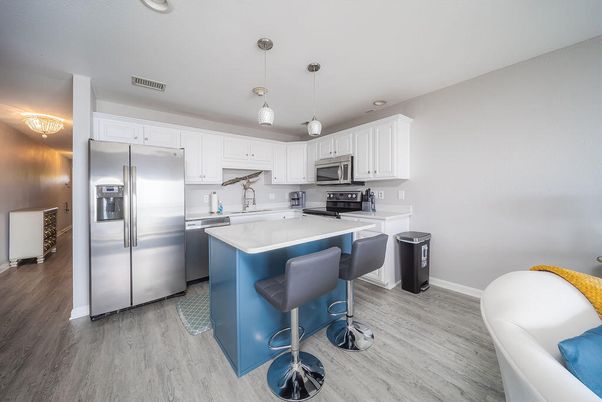 Interior, Kitchen, Pendant Lights, Recessed Lighting, Stainless Steel Appliances, Wood Texture Flooring