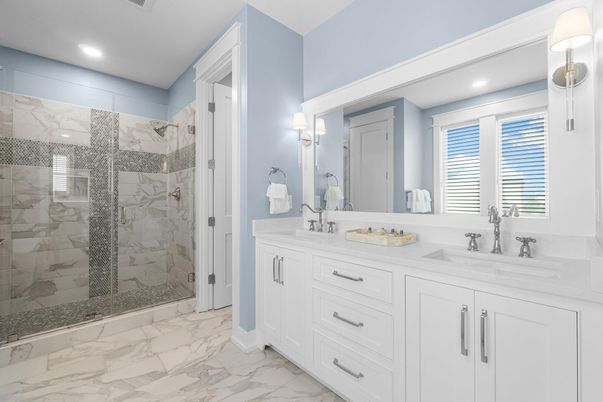 Bathroom, Dual Sink Vanities, Glass Shower, Interior, Marble, Marble Walls, Recessed Lighting