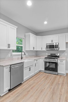 Interior, Kitchen, Recessed Lighting, Stainless Steel Appliances, Wood Texture Flooring