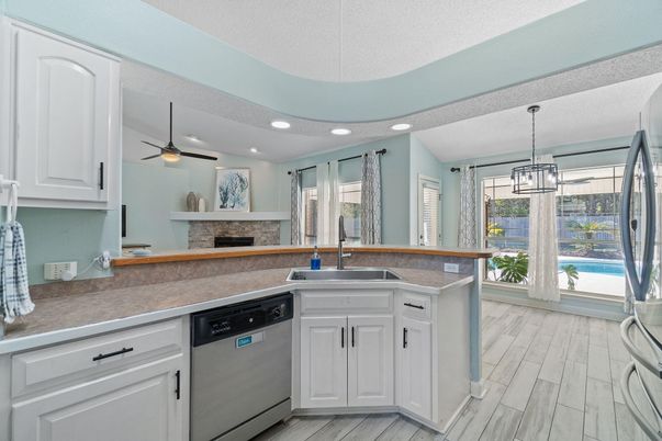 Fireplace, Interior, Kitchen, Pendant Lights, Recessed Lighting, Wood Texture Flooring