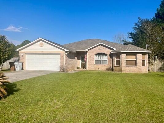 Attached, Backyard, Exterior, Facade, Brick Facade, Ranch