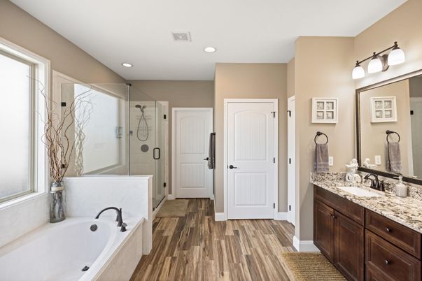 Bathroom, Dual Sink Vanities, Glass Shower, Interior, Recessed Lighting, Wood Texture Flooring