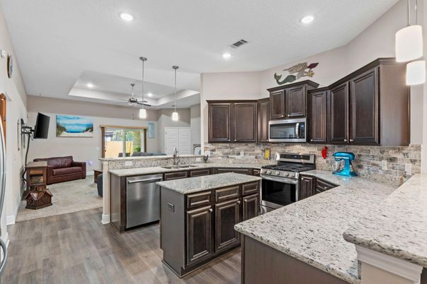 Interior, Kitchen, Pendant Lights, Recessed Lighting, Stainless Steel Appliances, Wood Texture Flooring