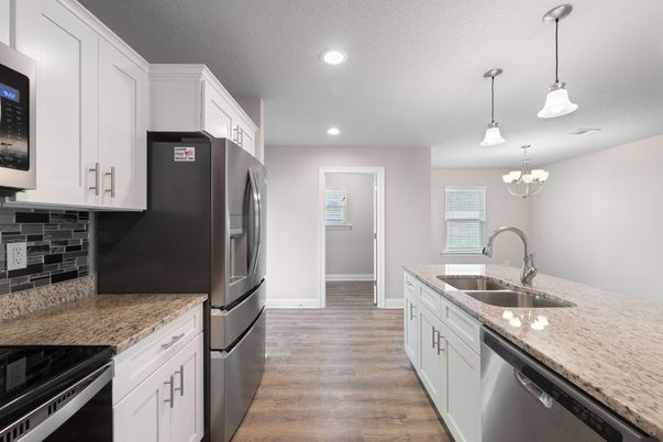 Chandelier, Interior, Kitchen, Pendant Lights, Recessed Lighting, Stainless Steel Appliances, Wood Texture Flooring