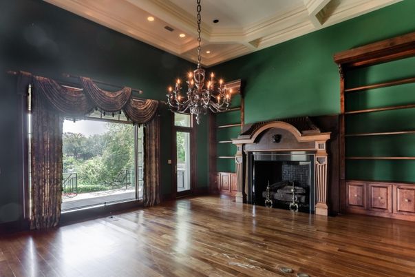 Chandelier, Empty room, Fireplace, Interior, Recessed Lighting, Wood Texture Flooring