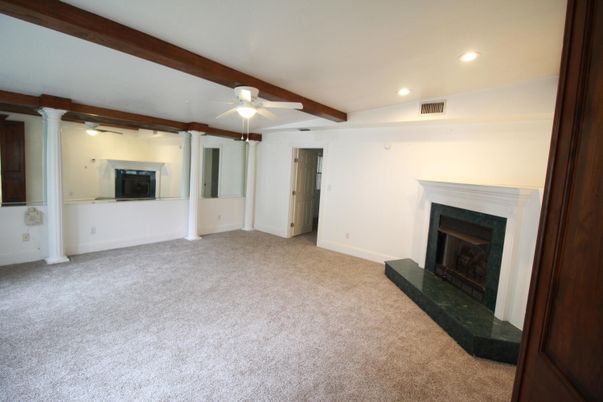 Empty room, Fireplace, Interior, Recessed Lighting, Wooden Beams
