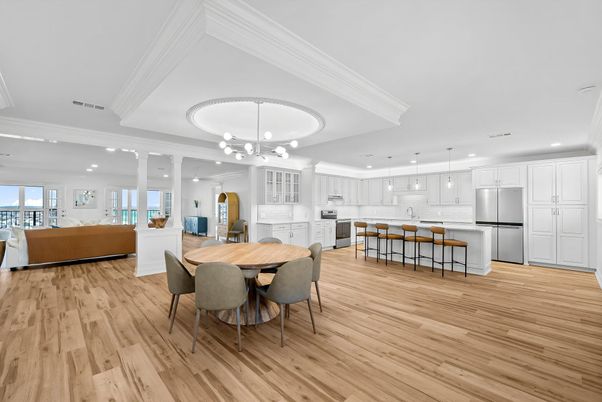 Chandelier, Dining room, Interior, Kitchen, Pendant Lights, Recessed Lighting, Stainless Steel Appliances, Wood Texture Flooring