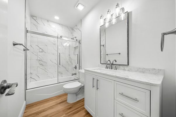 Bathroom, Glass Shower, Interior, Marble Walls, Recessed Lighting, Wood Texture Flooring