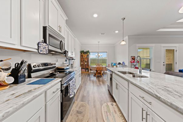 Dining room, Interior, Kitchen, Pendant Lights, Recessed Lighting, Stainless Steel Appliances, Wood Texture Flooring
