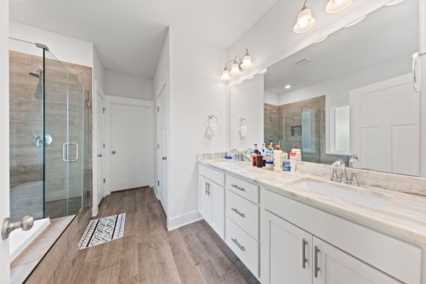 Bathroom, Dual Sink Vanities, Glass Shower, Interior, Wood Texture Flooring