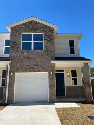 Attached, Exterior, Facade, Brick Facade, Brick Traditional