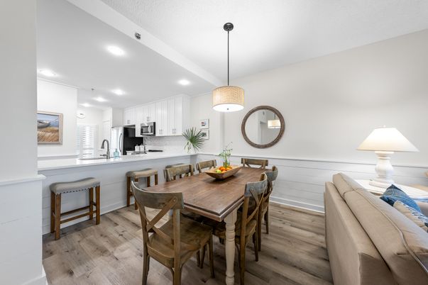 Dining room, Interior, Kitchen, Pendant Lights, Recessed Lighting, Stainless Steel Appliances, Wood Texture Flooring
