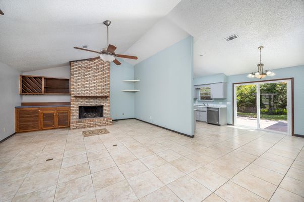 Empty room, Fireplace, Interior, Kitchen, Pendant Lights, Stone Walls