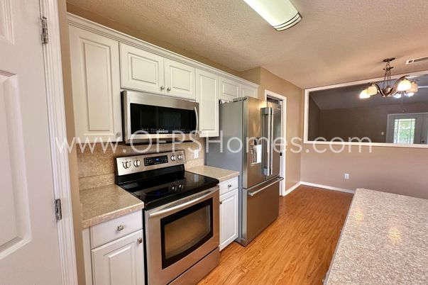 Interior, Kitchen, Pendant Lights, Stainless Steel Appliances, Wood Texture Flooring