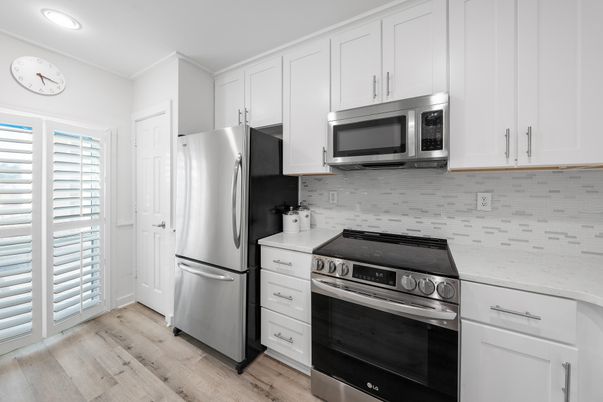 Interior, Kitchen, Recessed Lighting, Stainless Steel Appliances, Wood Texture Flooring