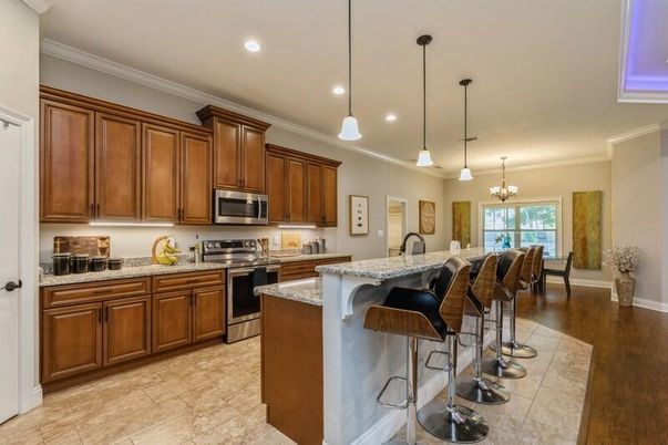Chandelier, Dining room, Interior, Kitchen, Pendant Lights, Recessed Lighting, Stainless Steel Appliances, Wood Texture Flooring