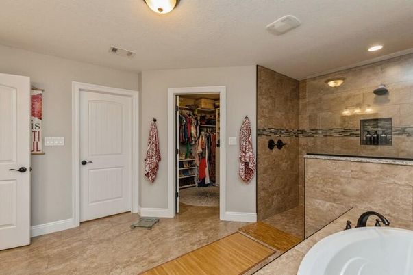 Bathroom, Glass Shower, Interior, Recessed Lighting, Walk-in Closets, Wood Texture Flooring