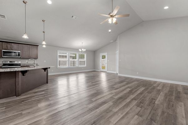 Chandelier, Empty room, Interior, Kitchen, Pendant Lights, Recessed Lighting, Stainless Steel Appliances, Wood Texture Flooring