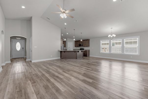 Chandelier, Empty room, Interior, Kitchen, Pendant Lights, Recessed Lighting, Stainless Steel Appliances, Wood Texture Flooring