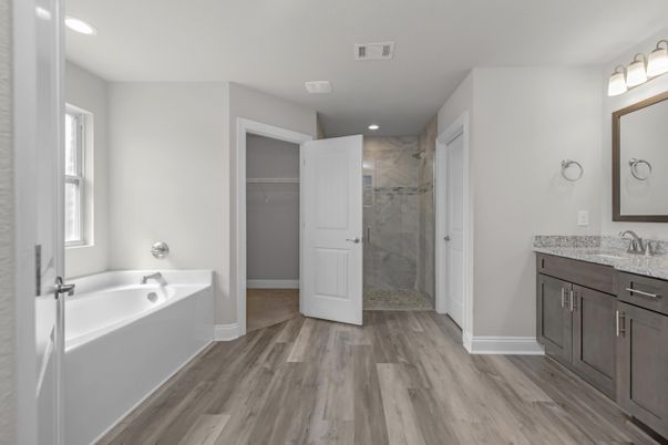 Bathroom, Glass Shower, Interior, Marble Walls, Recessed Lighting, Wood Texture Flooring