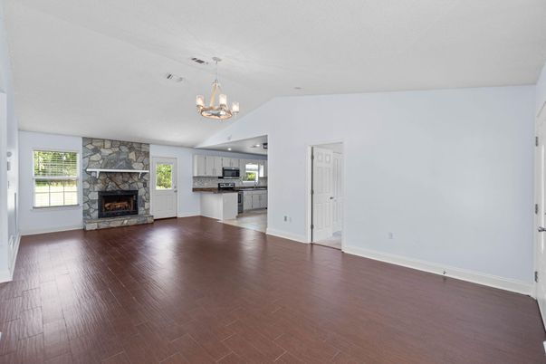Chandelier, Empty room, Fireplace, Interior, Kitchen, Wood Texture Flooring