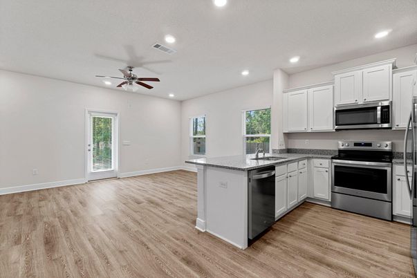 Interior, Kitchen, Recessed Lighting, Stainless Steel Appliances, Wood Texture Flooring