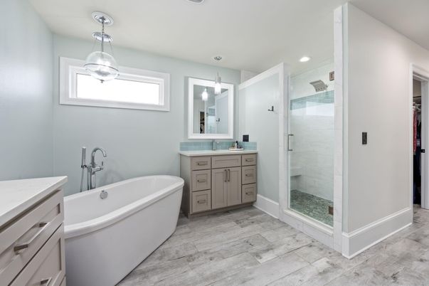 Bathroom, Dual Sink Vanities, Free Standing Baths, Glass Shower, Interior, Pendant Lights, Recessed Lighting, Wood Texture Flooring