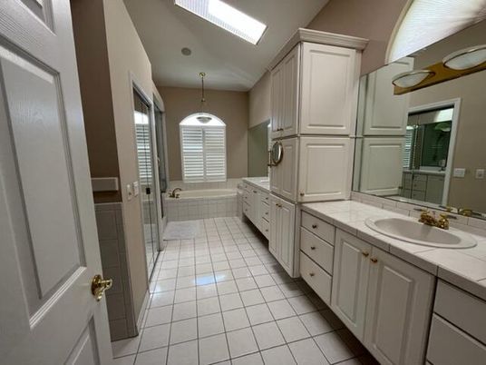 Bathroom, Dual Sink Vanities, Interior, Pendant Lights, Tile Countertops