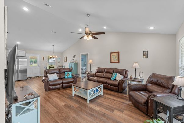 Chandelier, Dining room, Interior, Kitchen, Living room, Recessed Lighting, Stainless Steel Appliances, Wood Texture Flooring