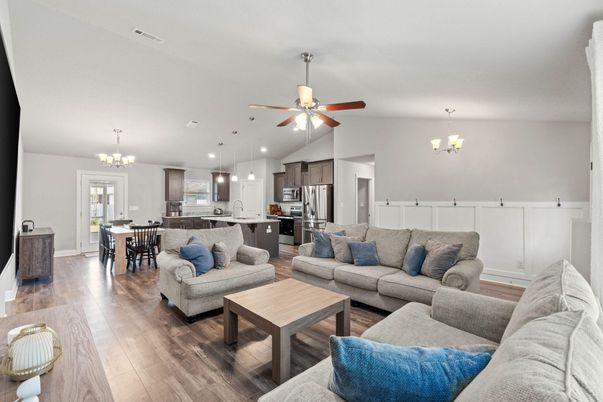 Chandelier, Dining room, Interior, Kitchen, Living room, Pendant Lights, Recessed Lighting, Stainless Steel Appliances, Wood Texture Flooring