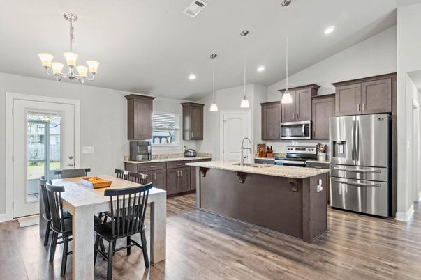 Chandelier, Interior, Kitchen, Pendant Lights, Recessed Lighting, Stainless Steel Appliances, Wood Texture Flooring