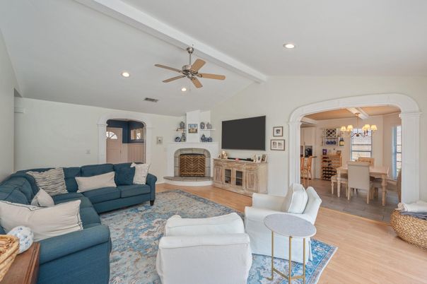 Chandelier, Dining room, Fireplace, Interior, Living room, Recessed Lighting, Wood Texture Flooring
