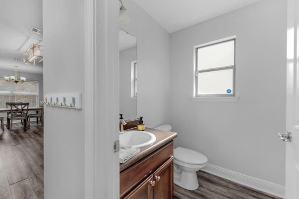 Bathroom, Chandelier, Dining room, Interior, Wood Texture Flooring