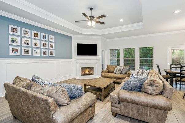 Dining room, Fireplace, Interior, Living room, Recessed Lighting, Wood Texture Flooring