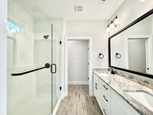 Bathroom, Dual Sink Vanities, Glass Shower, Interior, Wood Texture Flooring