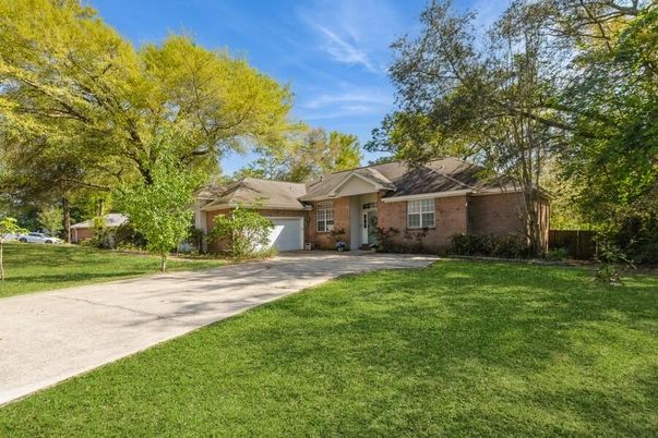 Attached, Backyard, Exterior, Facade, Brick Facade, Ranch