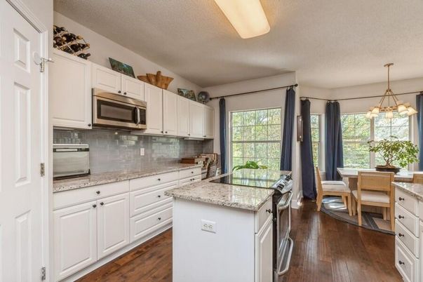 Dining room, Interior, Kitchen, Pendant Lights, Stainless Steel Appliances, Wood Texture Flooring